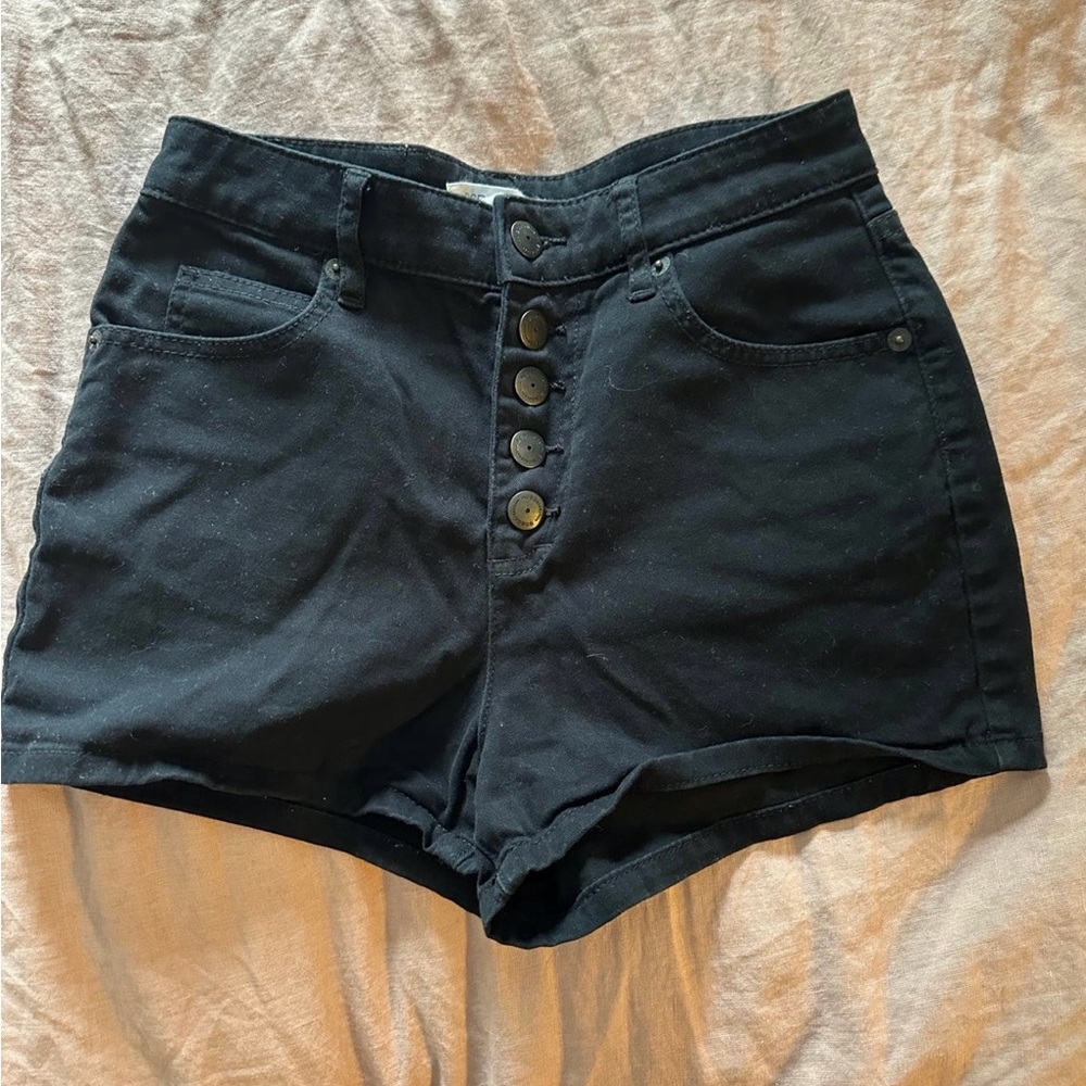High-waisted button up black BCBG shorts
Size: 26
Color: black